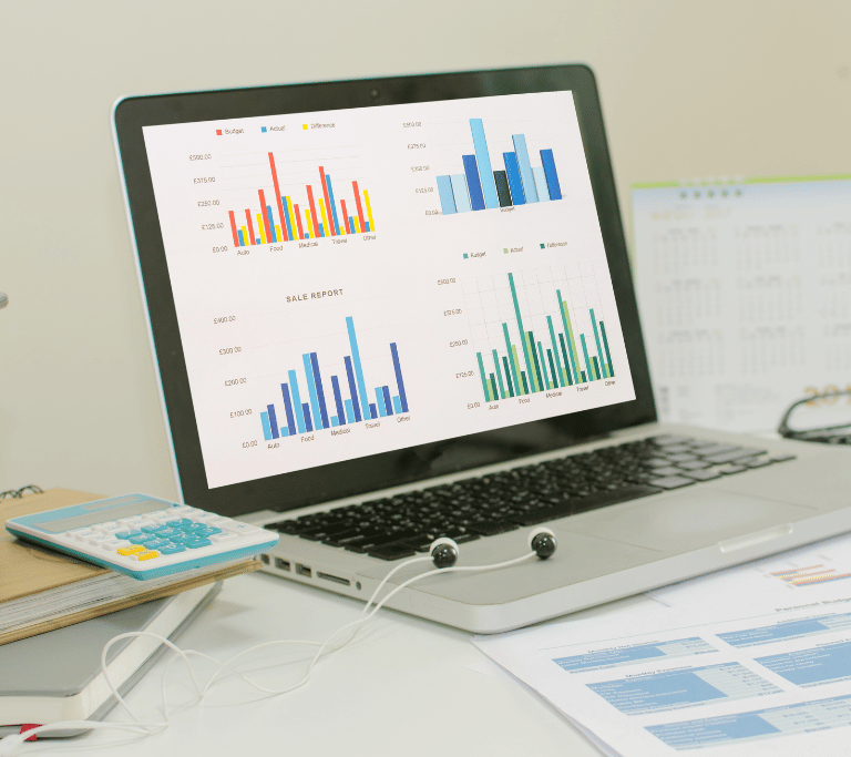 computer screen with sales reports on it